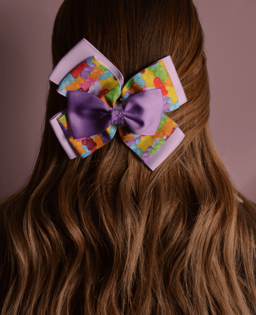 Purple gummy bear hair bow